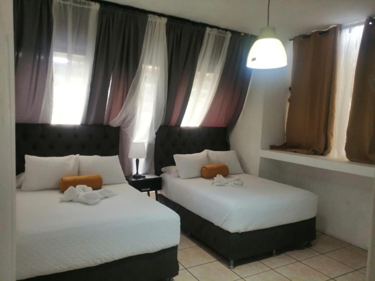Global Airport Inn Free Shuttle Гватемала Экстерьер фото